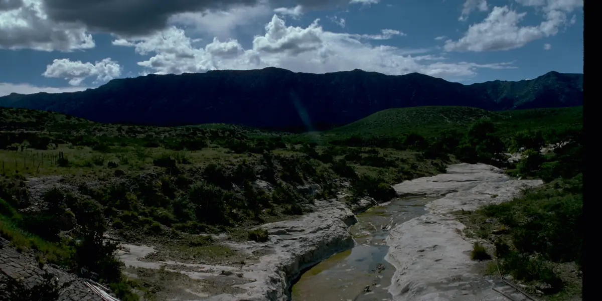 Desert canyon country below the Guadalupe Mountains under a cloudy sky, West Texas